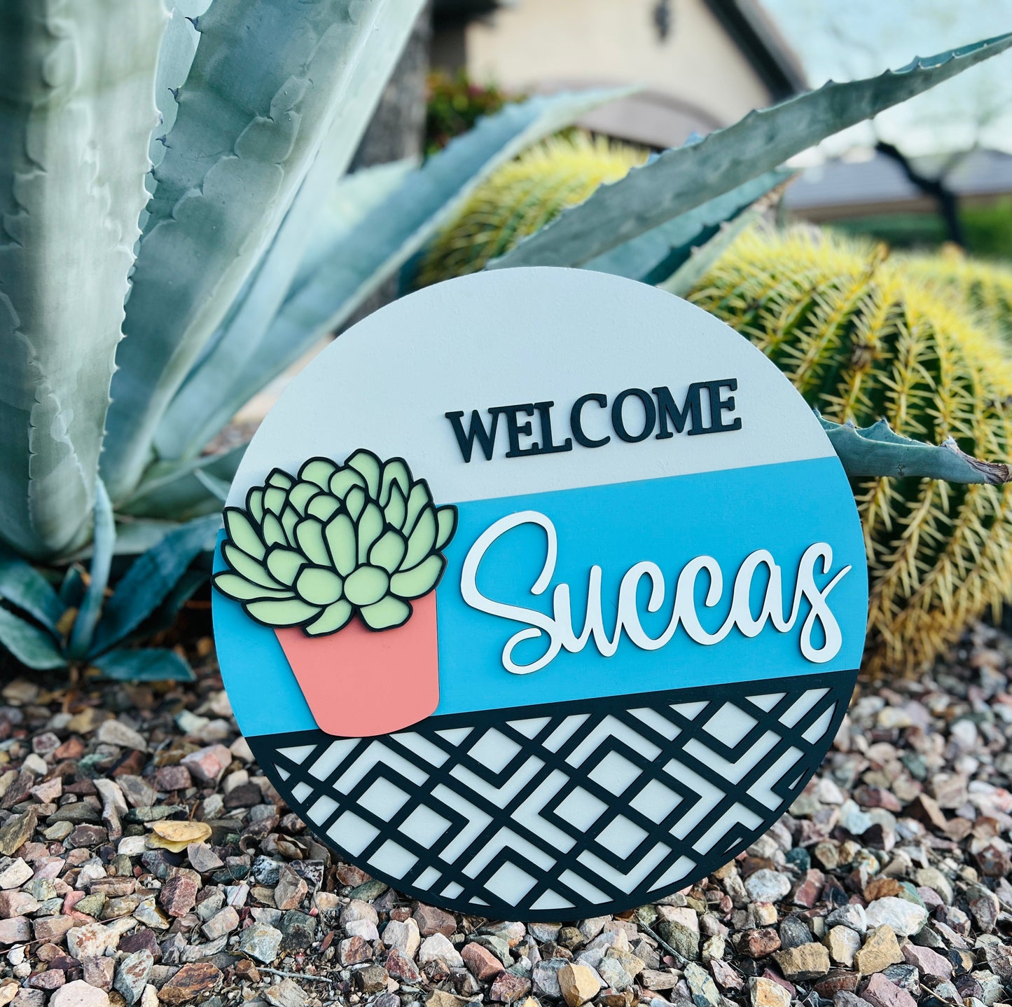 "Welcome Succas" Round Sign